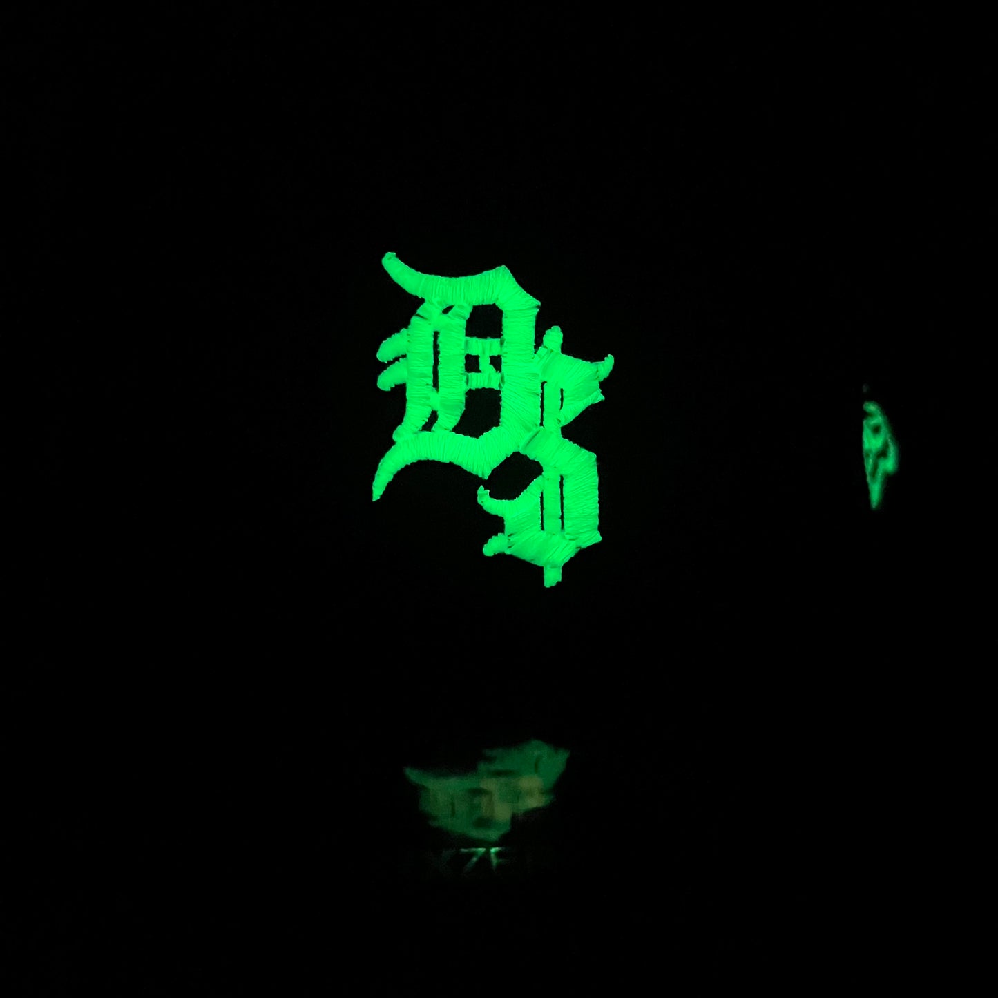 GLOW D$ TRUCKER HAT